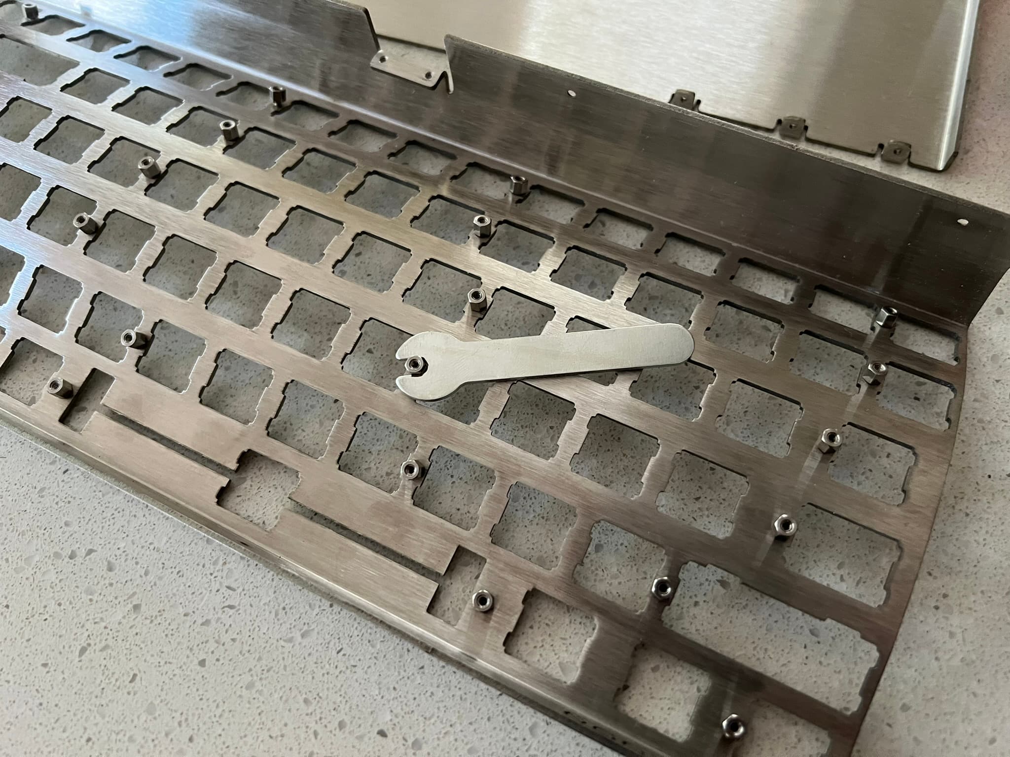 Wrench on standoff on plate