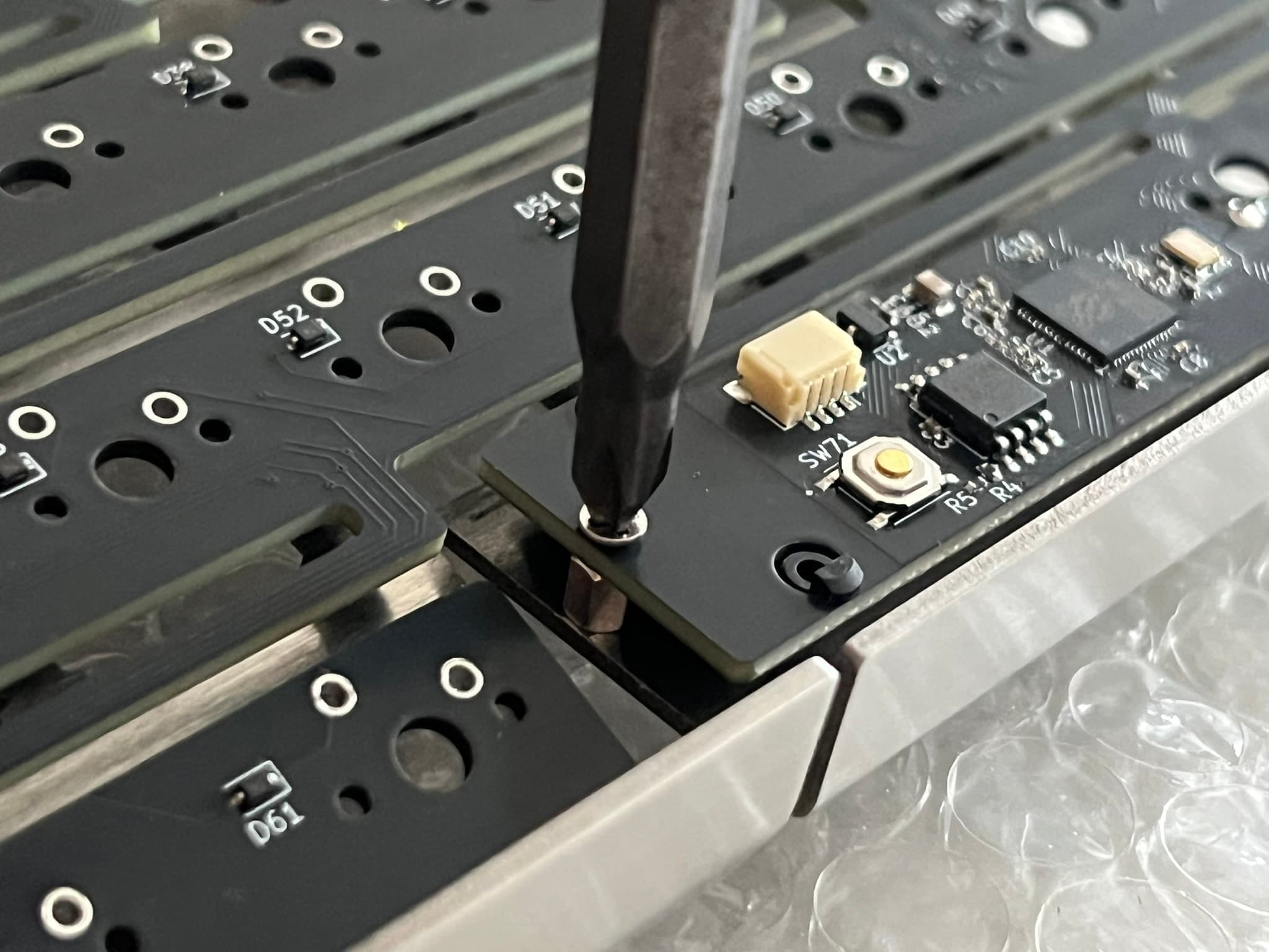 Screwing PCB into spacebar standoffs